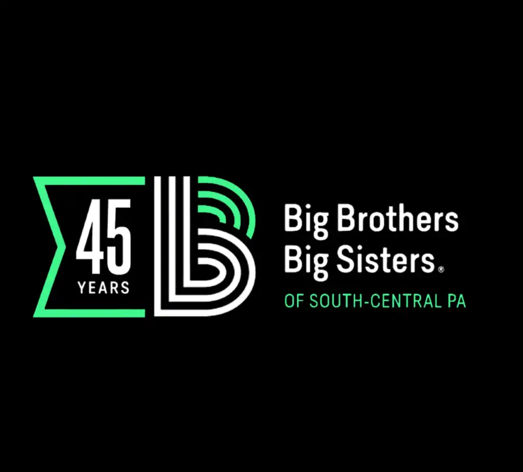Big Brothers Big Sisters of South-Central PA 45th anniversary logo on black, celebrating decades of community support and impact.